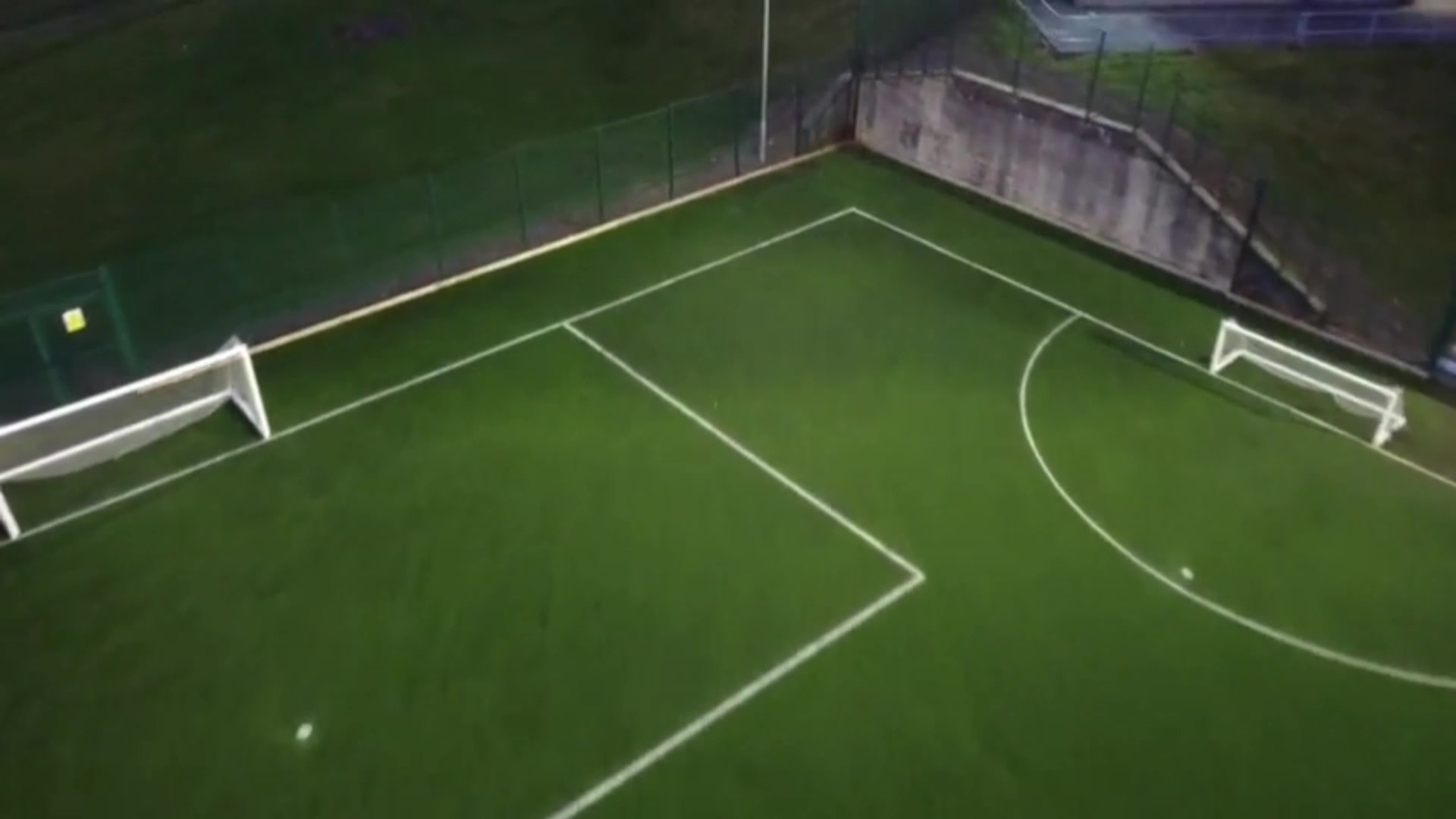 An artificial pitch with goals, seen from above